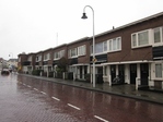 Straatwand.
              <br/>
              Bas van Roijen